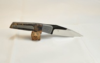 Folding knife, flipper. n690 steel, titanium and maple